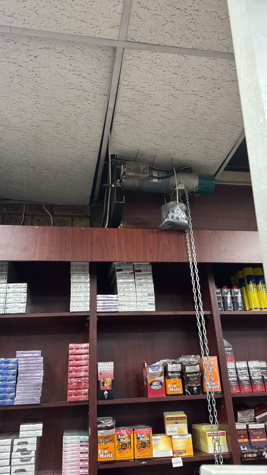 jammed-chain-operated-roller-shutter-door-edenvale-repaired-by-century-doors