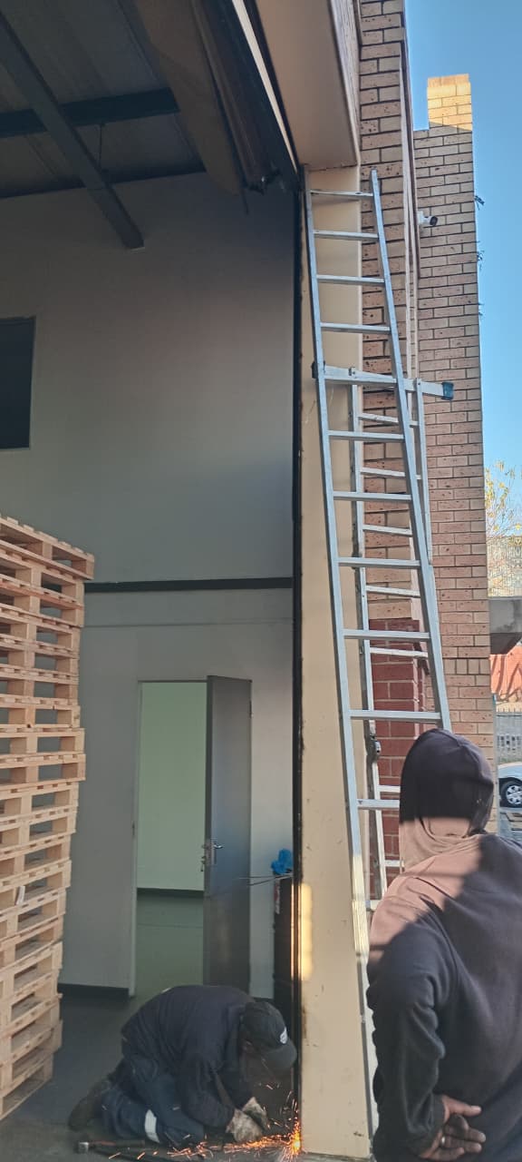 damaged-roller-shutter-slats-door-repaired-in-linbro-park-by-century-company