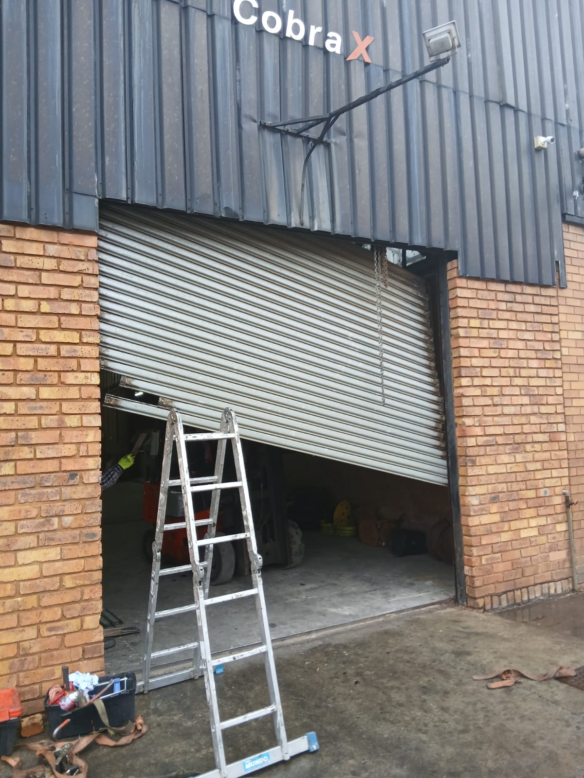 urgent-repair-done-by-Century-doors-factory-roller-shutter