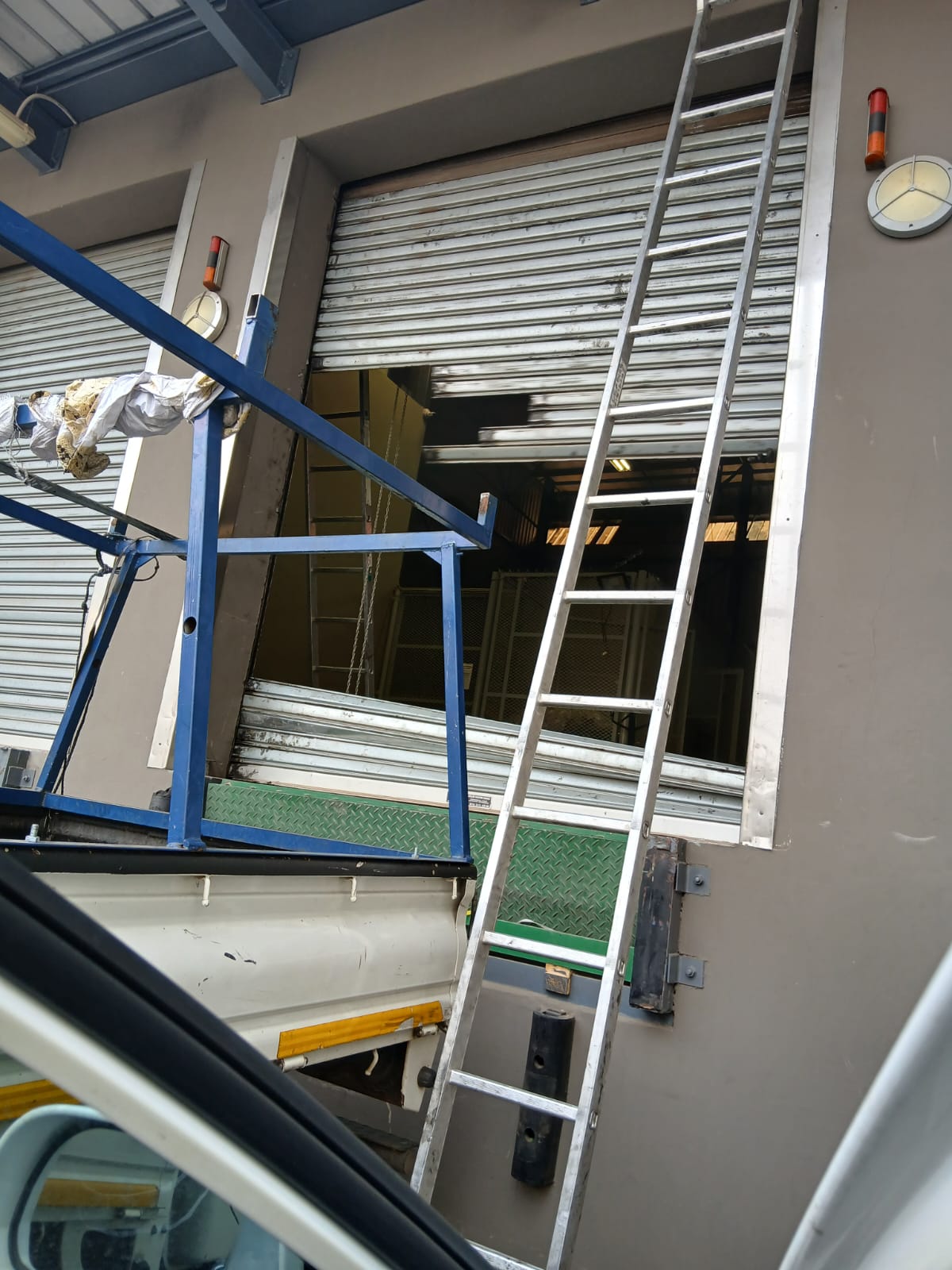 damaged-factory-roller-shutter-door-fixed-by-century-team-longmeadow-business-park
